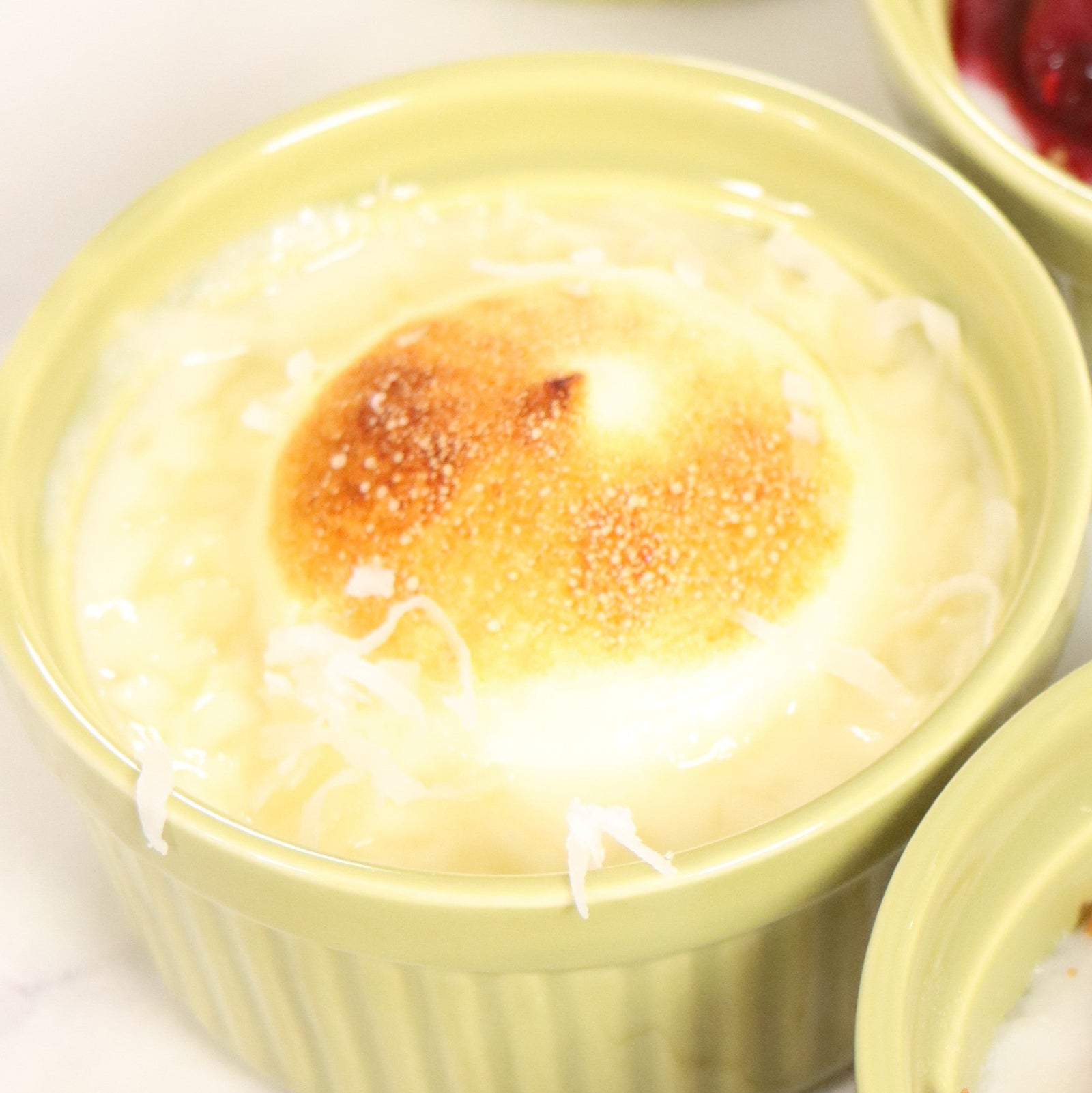 Coconut Cream with Red Fruit and Coconut Crumble