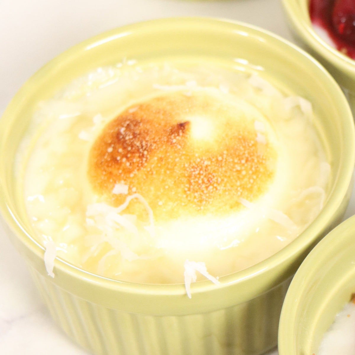 Coconut Cream with Red Fruit and Coconut Crumble